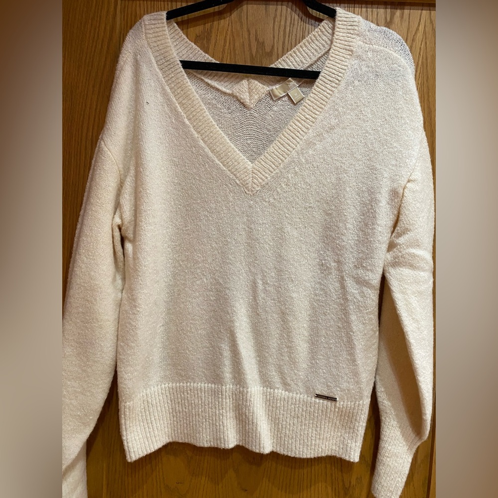 Michael Kors Women’s size medium cream sweater.